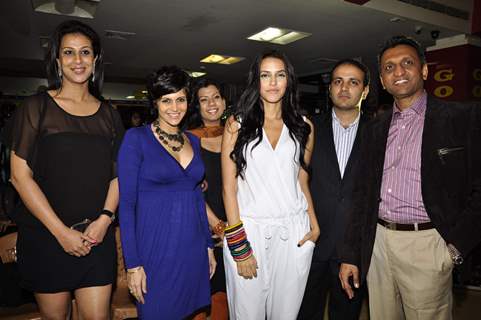 Neha Dhupia and Mandira Bedi launches Gold Gym Calendar at Bandra. .