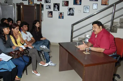 Satish Shah addressing students during a guest lecture at Roshan Taneja school of acting
