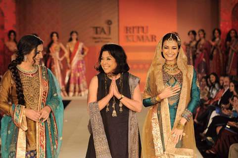 Dia Mirza and Shabana Azmi walking on the ramp for Ritu Kumar fashion show at Taj land's End. .