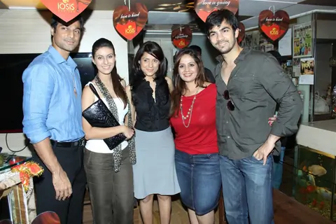 Karan V Grover, Simple Kaul and Khushboo Garewal at IOSIS event with underprivileged children