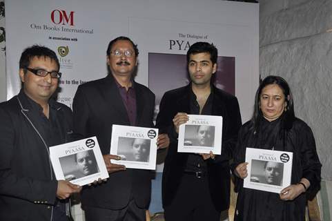 Karan Johar unveils Gurudutt's Pyaasa book at Olive Mumbai. .