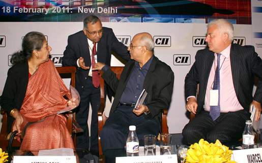 New Delhi,18 Feb 2011-I&B Minister Ambika Soni with CII Director General Chandrajit Banerjee, Chairman Reliance BIG Entertainment Amit Khanna and Pricewaterhouse Cooper's Marcel Fenez at the CII Content Summit ''Adapting from Wired to Wireless' ...