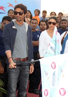 Arjun Rampal with wife at 'Lavasa Women’s Drive 2011' in Mumbai