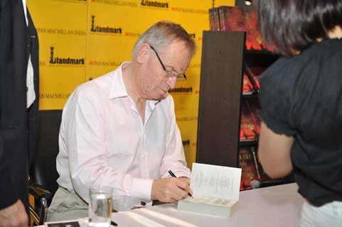 Author Jeffrey Archer signing books for fans at Landmark Bookstore, Vasant Kunj. .