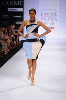 A model showcases a creation by designers Shivan and Narresh at Lakme Fashion Week day 2 in Mumbai. .