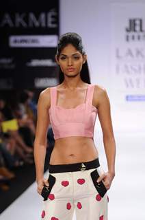 A model displays designer Jelin George's creations during the Lakme Fashion Week day 2 in Mumbai. .
