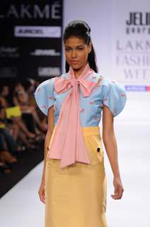 A model displays designer Jelin George's creations during the Lakme Fashion Week day 2 in Mumbai. .