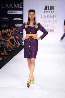 A model displays designer Jelin George's creations during the Lakme Fashion Week day 2 in Mumbai. .