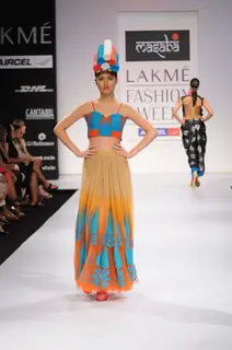 A model walks the runway at the Masaba's show at Lakme Fashion Week day 2 in Mumbai. .