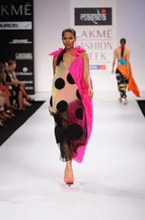 A model walks the runway at the Masaba's show at Lakme Fashion Week day 2 in Mumbai. .