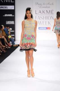 A model walks the runway at Pam & Arch London show at Lakme Fashion Week day 2 in Mumbai. .