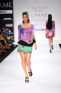 A model walks the runway at Pam & Arch London show at Lakme Fashion Week day 2 in Mumbai. .