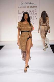A model displays designer Anand Kabra's creations during the Lakme Fashion Week day 2 in Mumbai. .