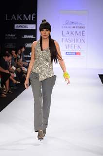 A model displays designer Anand Kabra's creations during the Lakme Fashion Week day 2 in Mumbai. .