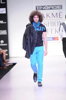 A model walks the runway at the Energie show at Lakme Fashion Week day 2 in Mumbai. .