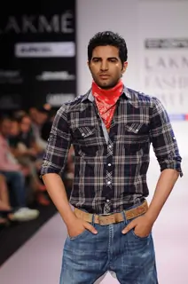 A model walks the runway at the Energie show at Lakme Fashion Week day 2 in Mumbai. .