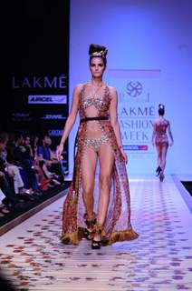 A model displays designer Priya Puri's creations during the Lakme Fashion Week day 4 in Mumbai. .