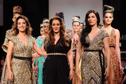 Model displays designer Priya Puri's creations during the Lakme Fashion Week day 4 in Mumbai. .