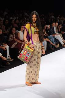 A model displays designer Sabashe by Sabah Khan's creations during the Lakme Fashion Week day 4 in Mumbai. .