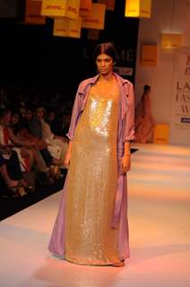 A model displays designer Astu's creations during the Lakme Fashion Week day 4 in Mumbai. .