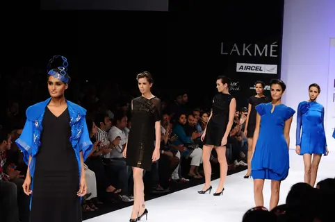 Models display designer Harangad Singh's creation during the Lakme Fashion Week 2011 Day 5 in Grand Hyatt, Mumbai. .