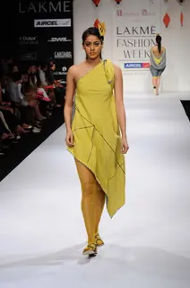 A model displays designer Abhishek Dutta's creations during the Lakme Fashion Week 2011 Day 5 in Grand Hyatt, Mumbai. .