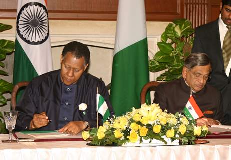 External Affairs Minister S M Krishna and Minister of Foreign Affairs, Nigeria,Henry Odien Ajumogobia,signing the agreement in New Delhi on Wed 16 March 2011. (IANS Photo).
