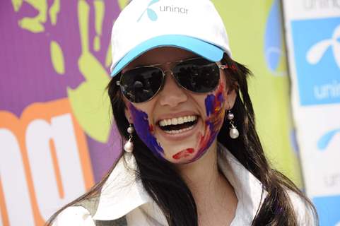 Yana charms at Uninor Holi event for NGO children at Xaviers Institute. .