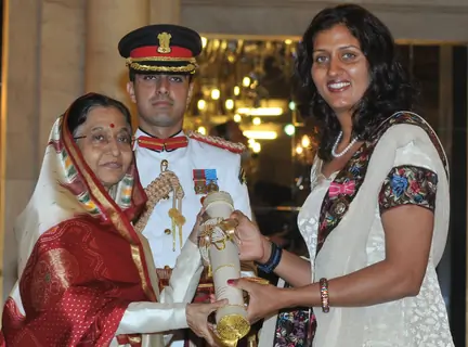 The President,Pratibha Devisingh Patil presenting the Padma Shri Award to Krishna Poonia, at an Investiture Ceremony II, at Rashtrapati Bhavan, in New Delhi