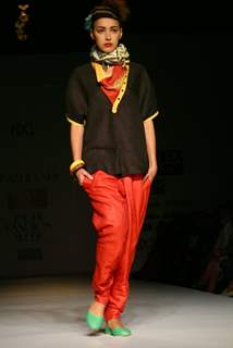 A Model showcasing designer Urvashi Kaur's creation at the Wills Lifestyle India Fashion Week autumn inter 2011 in New Delhi on Wed 6 April 2011. .