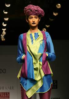 A Model showcasing designer Urvashi Kaur's creation at the Wills Lifestyle India Fashion Week autumn inter 2011 in New Delhi on Wed 6 April 2011. .