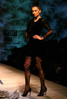 A model showcasing designer Varun Bhal's creation at the Wills Lifestyle India Fashion Week autumn winter 2011,in New Delhi on Wednesday. .
