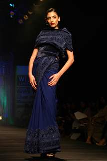 A model showcasing designer Tarun Tahiliani's creation at the Wills Lifestyle India Fashion Week autumn winter 2011,in New Delhi on Wednesday. .