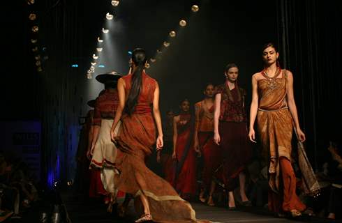 Models showcasing designer Tarun Tahiliani's creations at the Wills Lifestyle India Fashion Week autumn winter 2011,in New Delhi on Wednesday. .