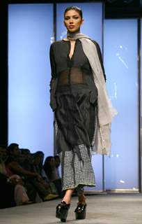 A model showcasing designer Abraham & Thakore's creation at the Wills Lifestyle India Fashion Week autumn winter 2011 in New Delhi on Saturday 9 April 2011. .