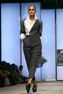 A model showcasing designer Abraham & Thakore's creation at the Wills Lifestyle India Fashion Week autumn winter 2011 in New Delhi on Saturday 9 April 2011. .