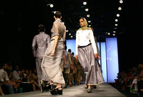 Models showcasing designer Abraham & Thakore's creation at the Wills Lifestyle India Fashion Week autumn winter 2011 in New Delhi on Saturday 9 April 2011. .