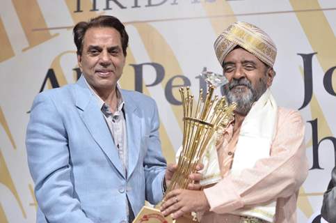 Actor Dharmendra launches Ali Peter's book on his 60th Birthday at PL Deshpande Hall. .