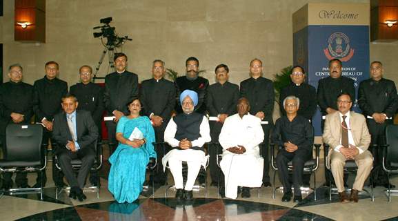 Prime Minister Manmohan Singh with the medal winners at CBI new Headquarter in New Delhi on Saturday. .