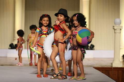 Kids walk the ramp at Silhousettes 2011 Vintage Vogue Fashion show by B. D. Somai Institute of Art