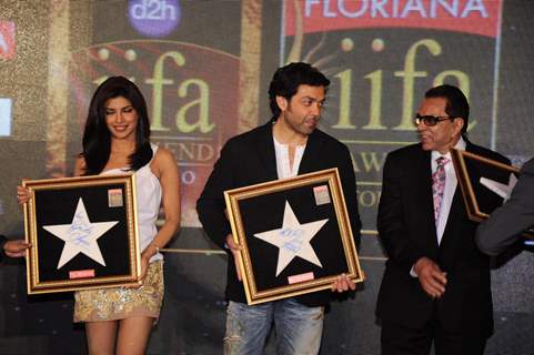 Priyanka Chopra, Dharmendra and Bobby Deol at IIFA press meet at Grand Hyatt