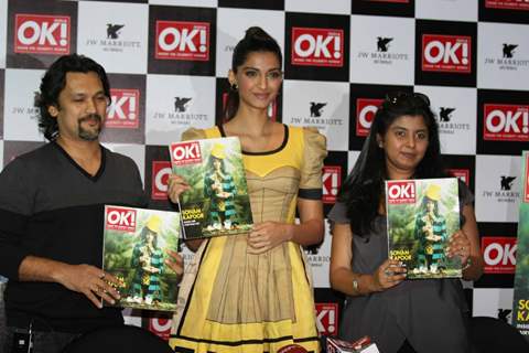 Sonam Kapoor shows off the OK magazine cover at its launch event held at Enigma in Mumbai