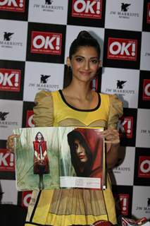 Sonam Kapoor shows off the OK magazine cover at its launch event held at Enigma in Mumbai