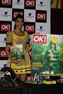 Sonam Kapoor shows off the OK magazine cover at its launch event held at Enigma in Mumbai