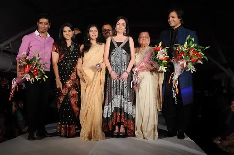 Nita Ambani, Kajol and Vivek Oberoi walk the ramp for Shaina NC and Manish Malhotra at the Pidilite-CPAA charity fashion show. .