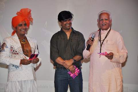 Narendra Singh & Komal Sain Shoor- MD of Agni at the launch of Sukhwinder Singh's bhajan album Sai Ram. .