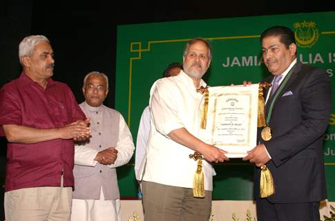 Jamia Millia Islamia's Vice-Chancellor Najeeb Jang conferring the title ''Nishan-e-Azad'' to Ambassador of Saudi Arabia Faisal Hasan Trad at a special ceremony,in New Delhi