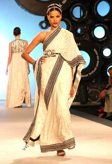 Model showcasing designer J J Valaya's creation at the  Synergy one Delhi Couture Week,in New Delhi