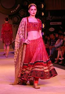 Model walks the ramp for designer J J Valaya's creation at the Synergy one Delhi Couture Week