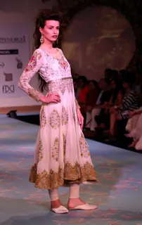 Model showcasing designer Varun Bhal's creation at the Synergy one Delhi Couture Week, in New Delhi